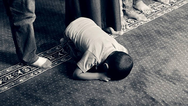 Muslim boy praying